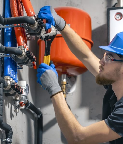 A man installs a heating system in a house and checks the pipes with a wrench. Adjusting heating valves in a residential building. A plumbing and heating technician works. SSUCv3H4sIAAAAAAAACpySz26DMAzG75P2DijnIlEoId2rVDuYJAOraVIlodNU9d2XP4Cy6274Z/uzv5jn+1tVkREccvJRPWMUYlRqcd6CR6MDbg4rt1ILaUvysB1tSgBYRlKgNxZBlXAEz2cNNxmgXpSK+JWSxHnwi5Mu7rIiDl5OQSPDXSIvfMlxtSVSMnSEFCGHgrllTGxDWfxfnfnjczc8Sc1/0sKFESuVhGzkkkvJ9dtLeyutwSLQFK4ehoOKBV2hBHgHC3/67hY56qkgxs/pLpsSN4v2Nm61myHKmDuMKr76VxgjNz6Dc6FcbLyYzcNfYG7FHG188rSqEhGOE8Nj1/W0HU6spYz2Z0aHtSAfdMagk9bZhELMryhKVxg3IKzhrB1oX7dHcapPtB9rxkZe0+bc8YbThg4QbvH6BQAA//8DAHfopdy5AgAA